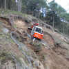 Recovery work on an escarpment with a ''spider-type'' digger.