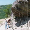 Urgent work supplying and laying rock-containing nets on the SS310 road.