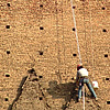 Restoration work on the walls of the ''Prendiparte-Bed & Brekfast'' Tower in Bologna